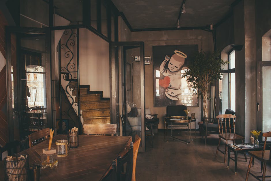 Warm and inviting restaurant interior featuring modern design elements and artistic wall decor.