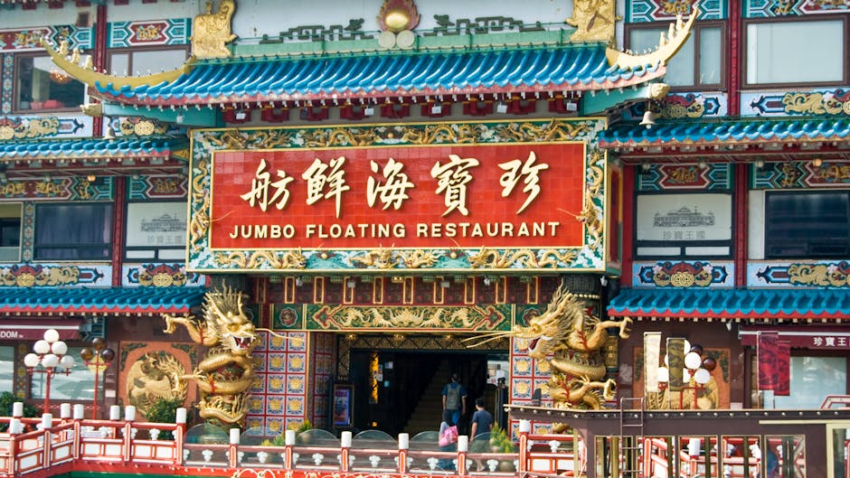 Front facade of the iconic Jumbo Floating Restaurant in Hong Kong with intricate Chinese architectural design